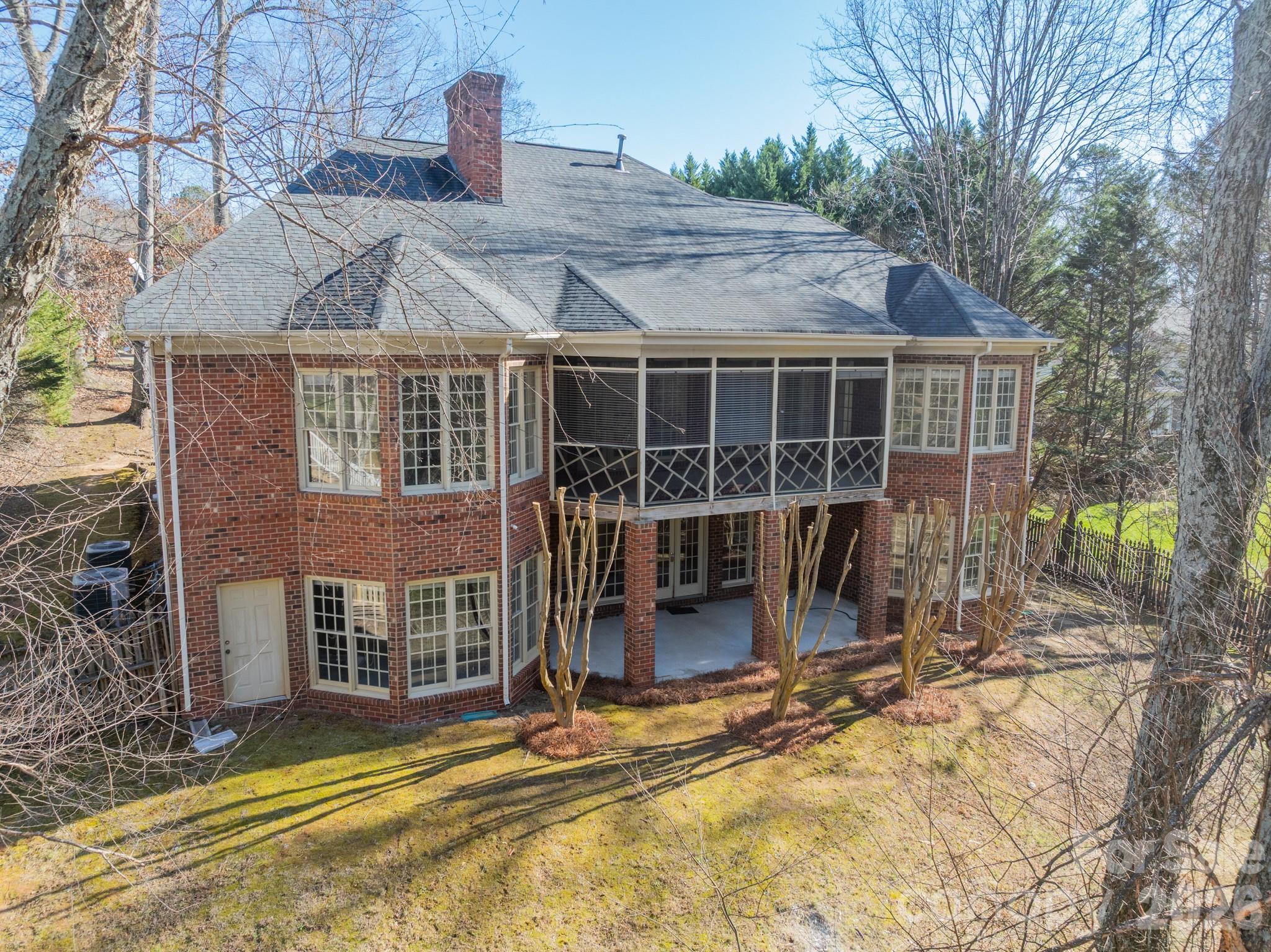 316 Kimberly Road Davidson, NC 28036 - Photo 32 of 37 a view of a house with backyard and porch