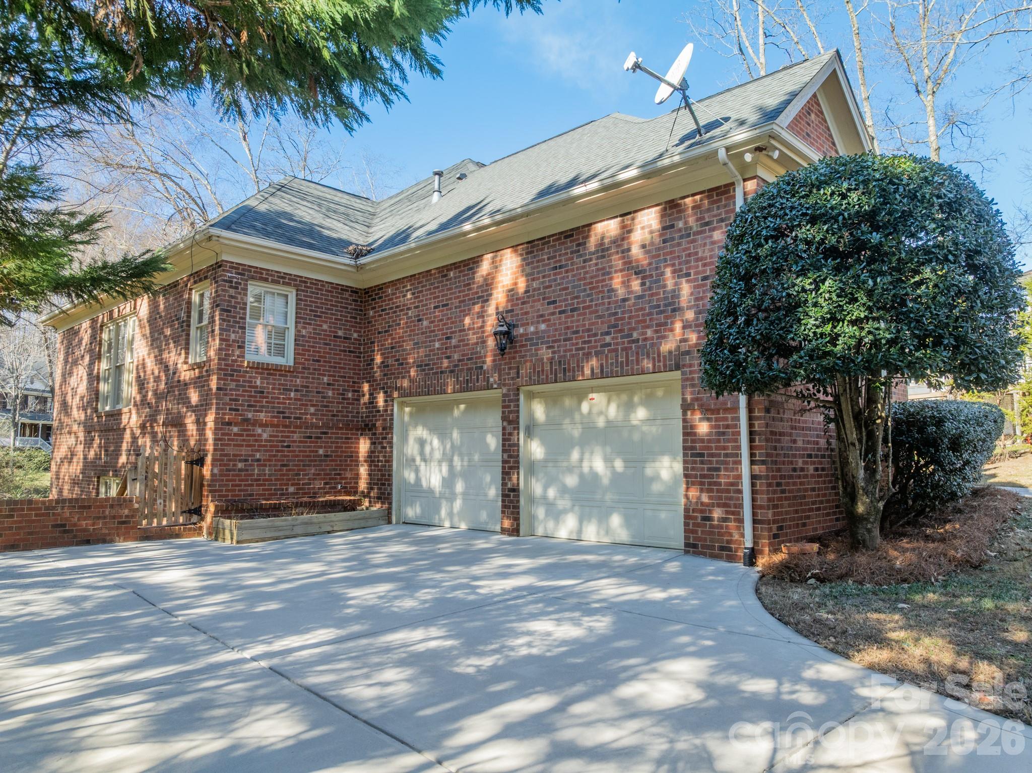 316 Kimberly Road Davidson, NC 28036 - Photo 4 of 37 a view of a house with a backyard
