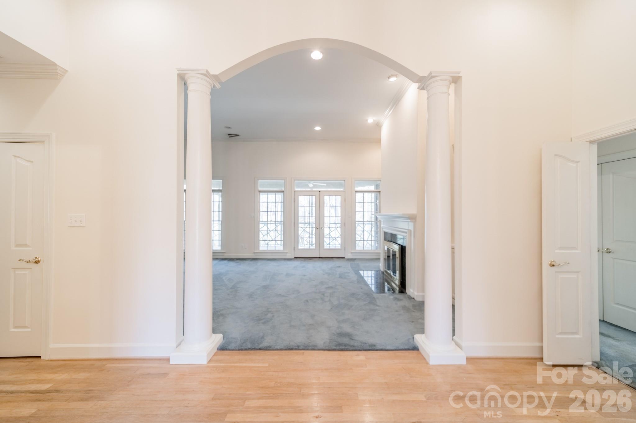 316 Kimberly Road Davidson, NC 28036 - Photo 8 of 37 a view of hallway with livingroom and stairs