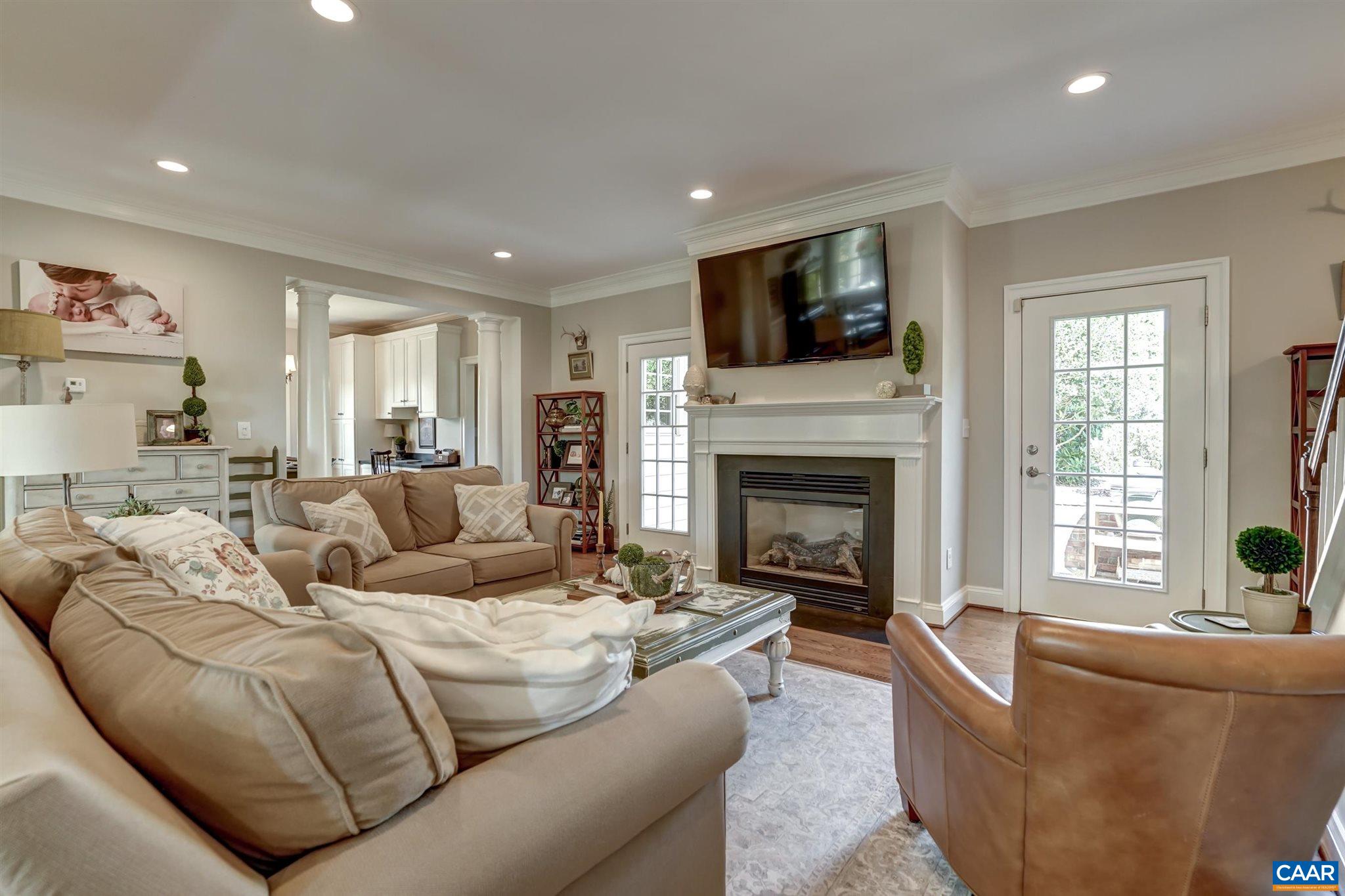 5047 Brook View Road Crozet, VA 22932 - Photo 11 of 68 a living room with furniture fireplace and flat screen tv