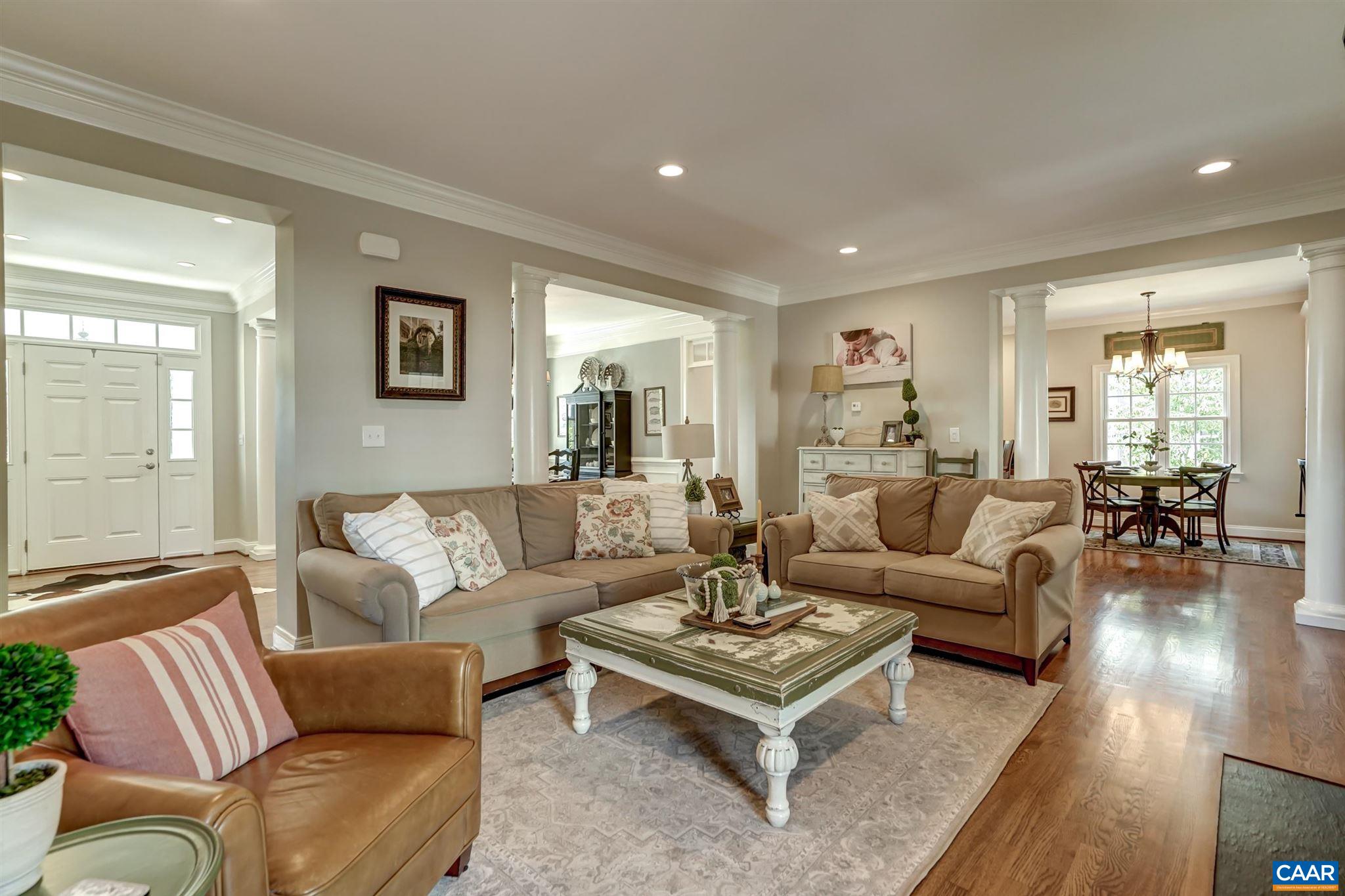 5047 Brook View Road Crozet, VA 22932 - Photo 12 of 68 a living room with furniture a rug and a window