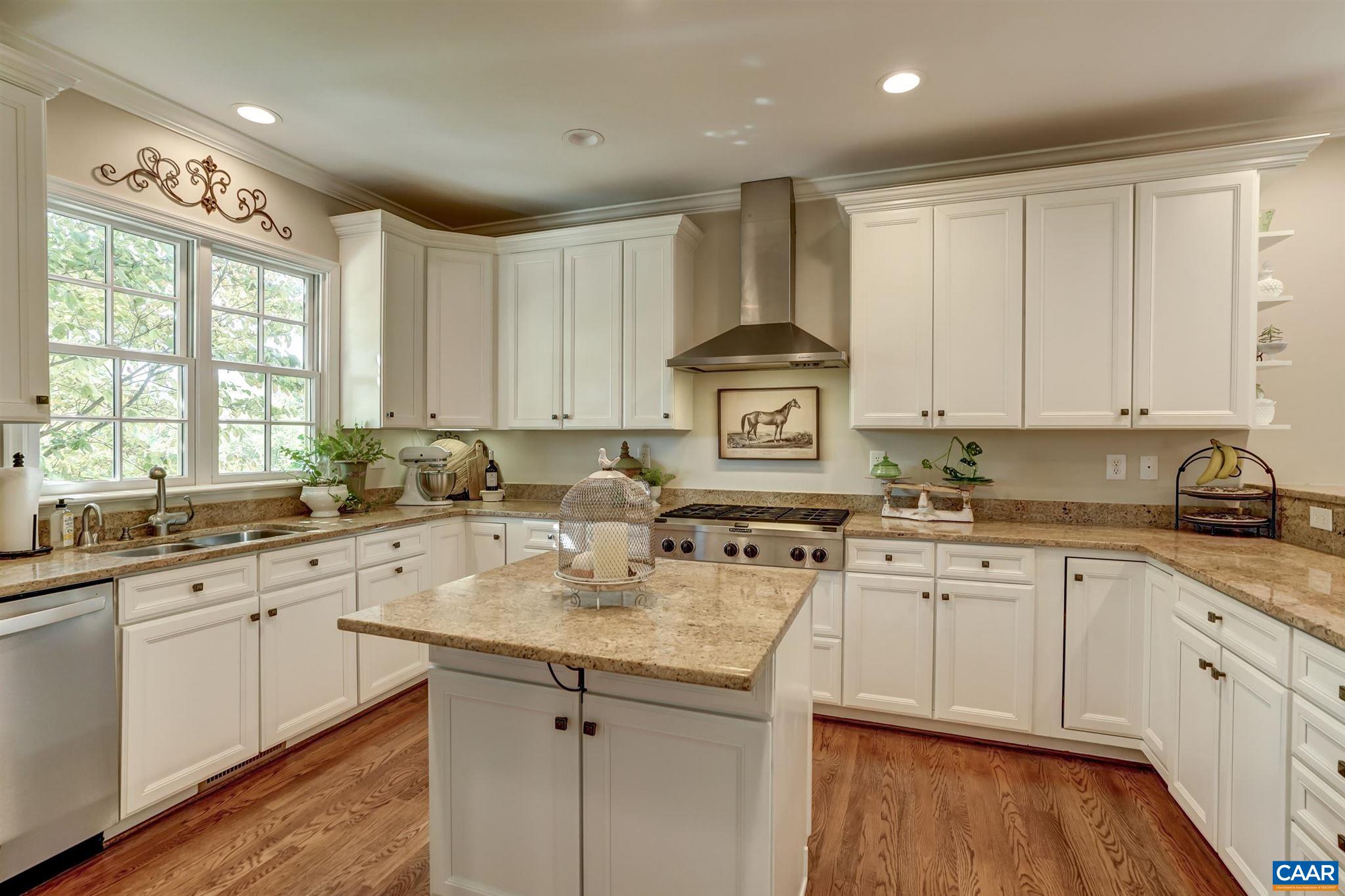 5047 Brook View Road Crozet, VA 22932 - Photo 15 of 68 a kitchen with a sink stove and cabinets