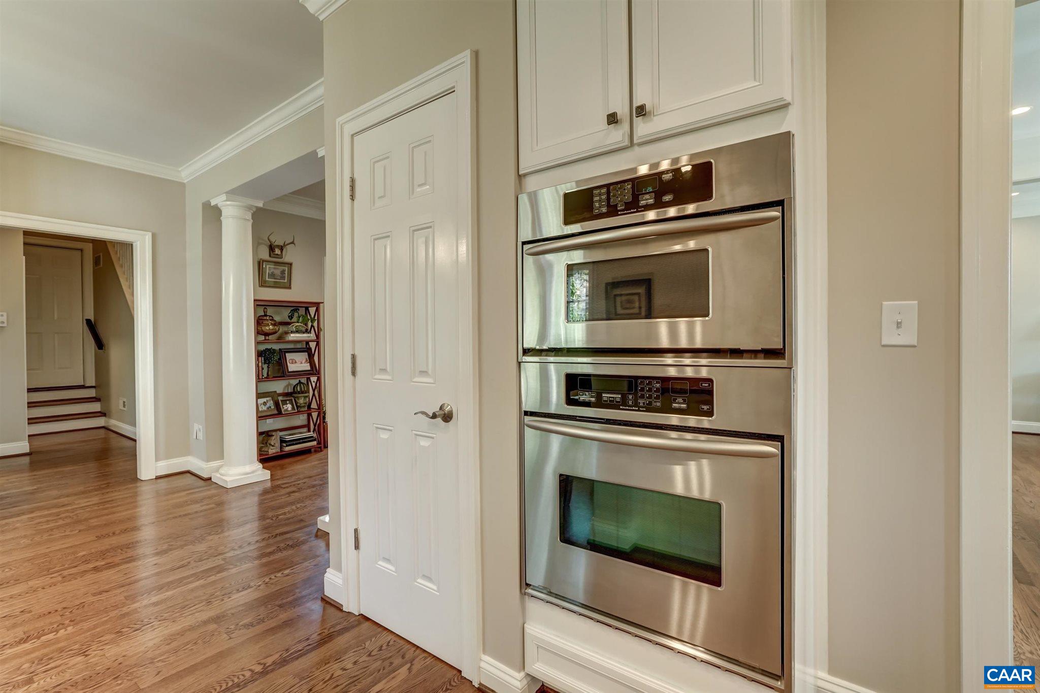 5047 Brook View Road Crozet, VA 22932 - Photo 16 of 68 a kitchen with granite countertop a stove and cabinets