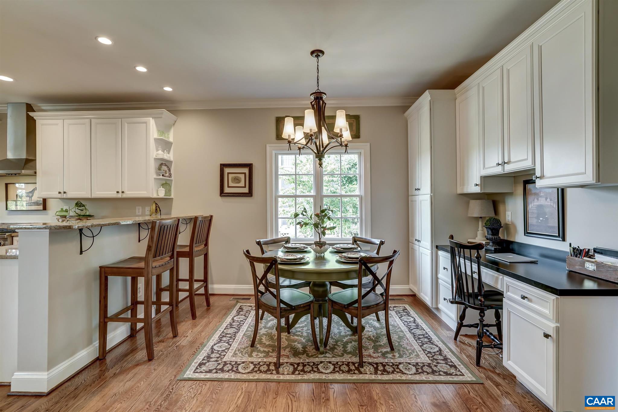 5047 Brook View Road Crozet, VA 22932 - Photo 20 of 68 a view of a dining room with furniture window and wooden floor