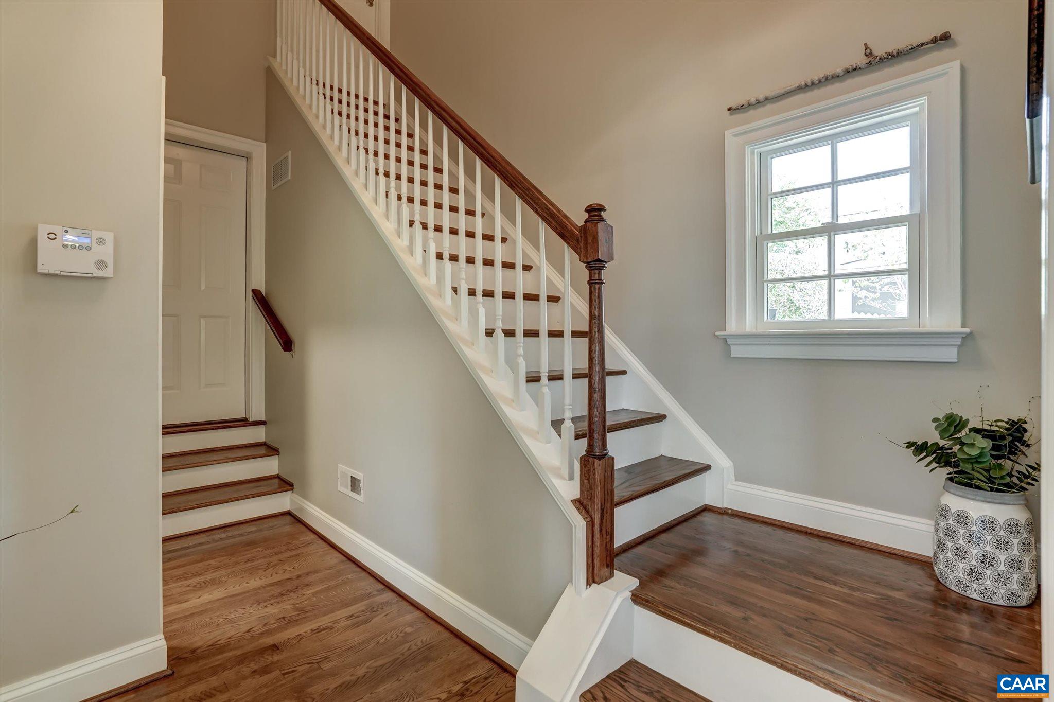 5047 Brook View Road Crozet, VA 22932 - Photo 36 of 68 a view of entryway with wooden floor and stairs