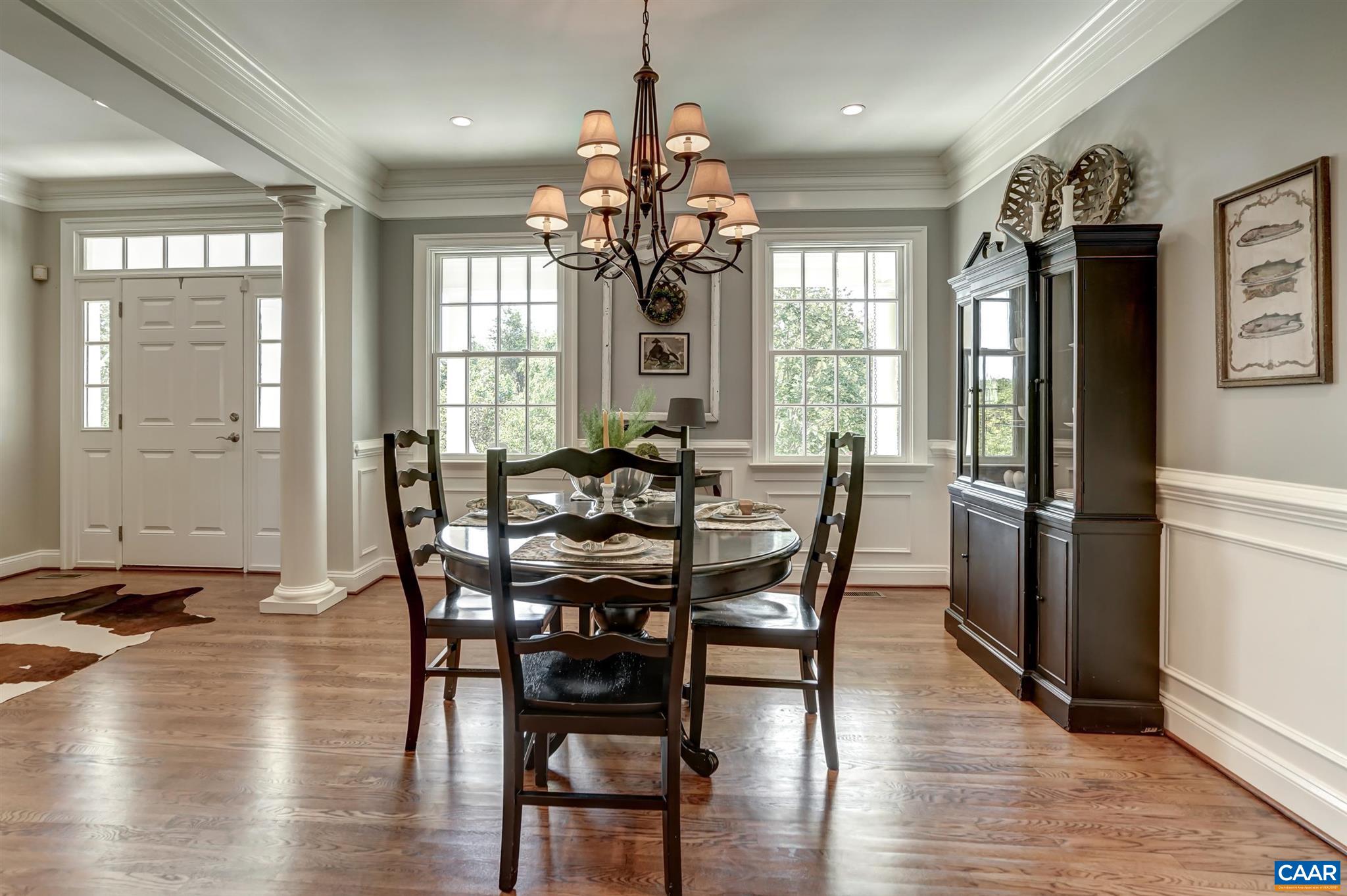 5047 Brook View Road Crozet, VA 22932 - Photo 9 of 68 a view of a a dining room with furniture window and wooden floor