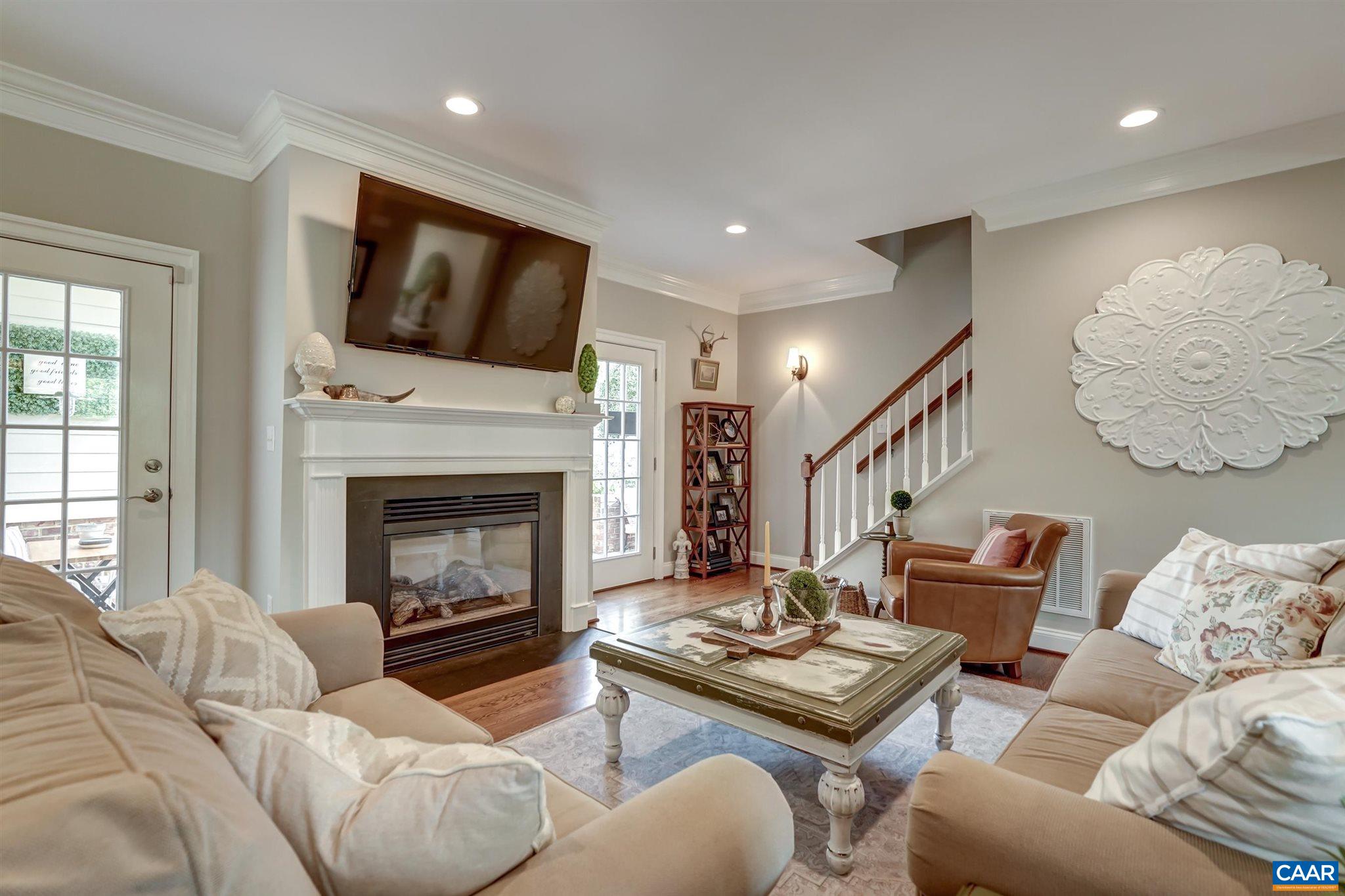 5047 Brook View Road Crozet, VA 22932 - Photo 10 of 68 a living room with furniture fireplace and flat screen tv