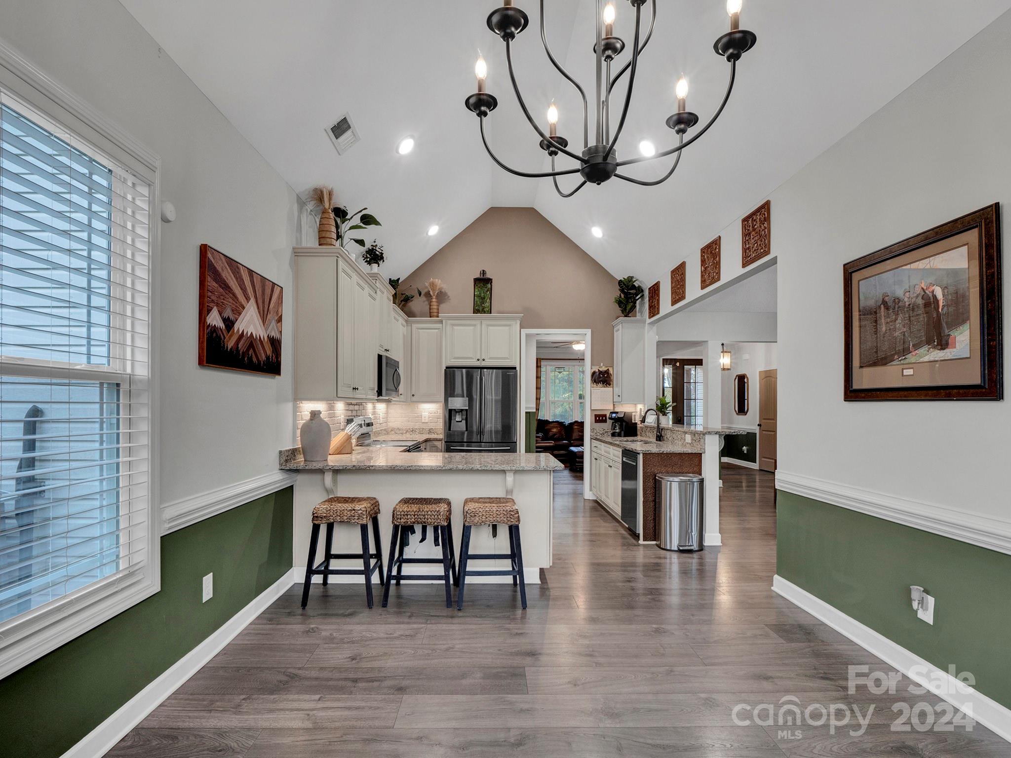 1854 State Rd S-46-168 York, SC 29745 - Photo 24 of 46 a view of a livingroom with furniture wooden floor chandelier