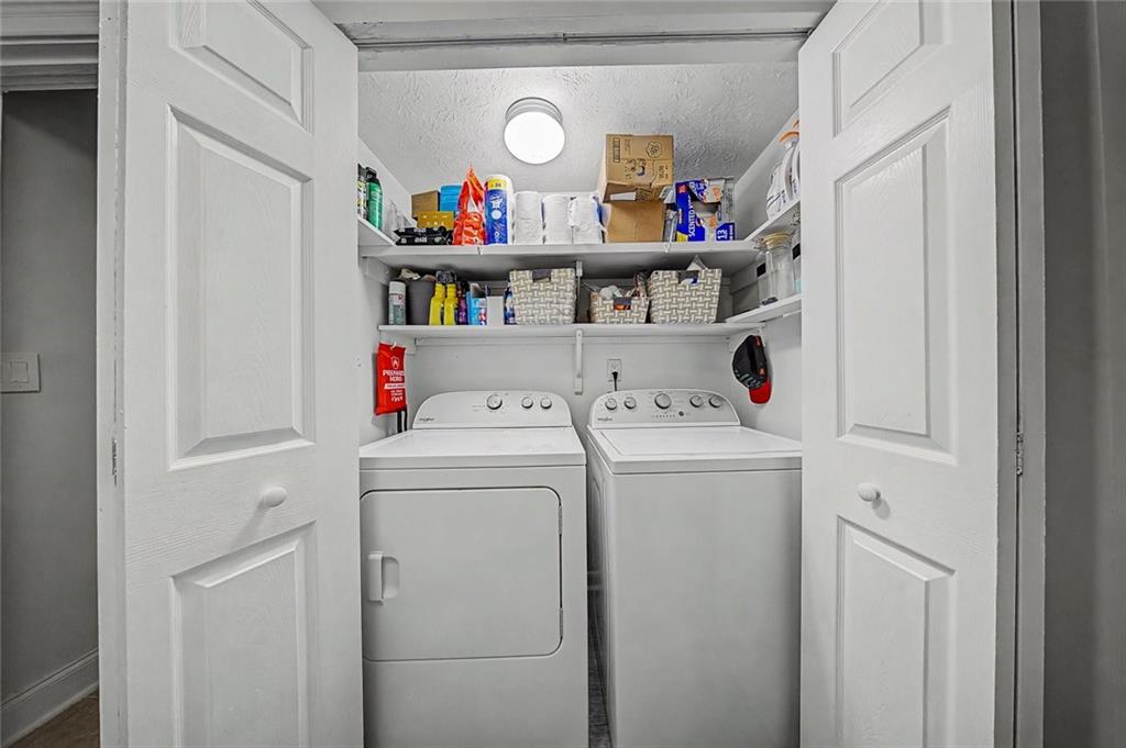 2911 Ironwood Road Southeast Marietta, GA 30067 - Photo 11 of 32 a utility room with dryer and washer