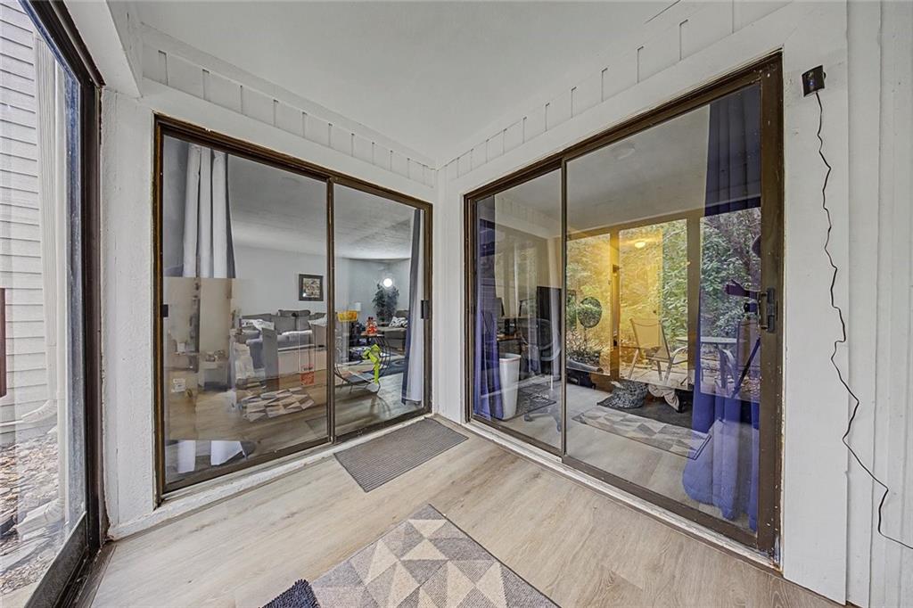 2911 Ironwood Road Southeast Marietta, GA 30067 - Photo 22 of 32 a room with window and a glass door