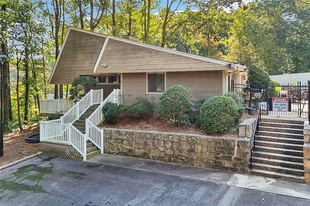 2911 Ironwood Road Southeast Marietta, GA 30067 - Photo 28 of 32 a view of a house with a yard