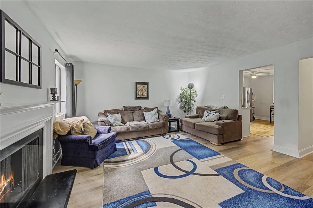 2911 Ironwood Road Southeast Marietta, GA 30067 - Photo 9 of 32 a living room with furniture rug and wooden floor