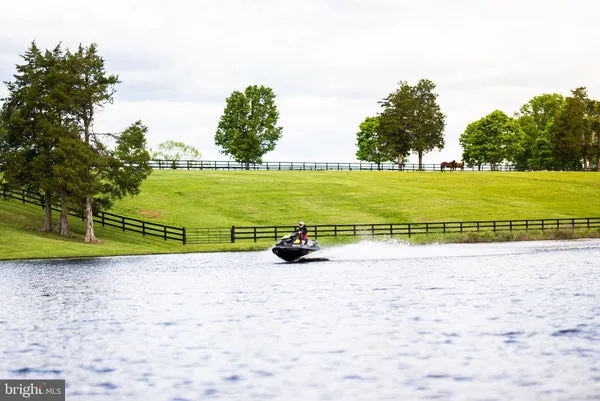 a view of lake with green space