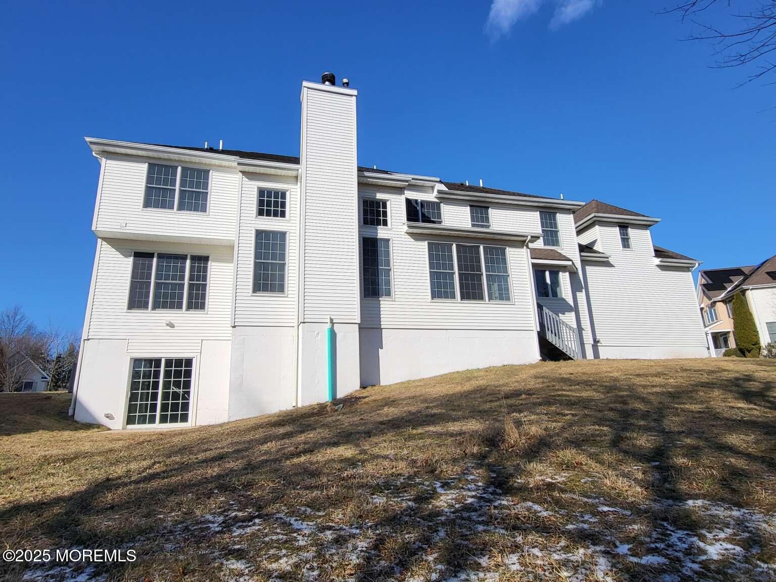 66 Potter Road Freehold, NJ 07728 - Photo 25 of 25 a front view of a house with a yard