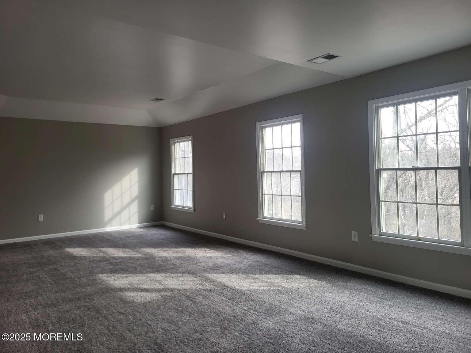 66 Potter Road Freehold, NJ 07728 - Photo 8 of 25 a view of an empty room with a window