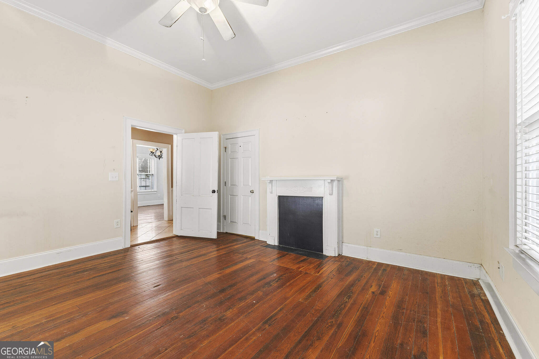 1469 Chestnut Street Macon, GA 31201 - Photo 12 of 26 a view of an empty room with wooden floor