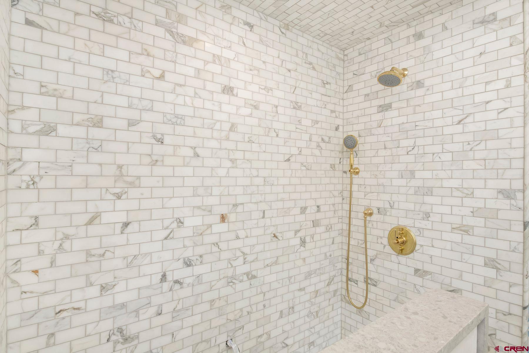 180 Elk Valley Road, Unit 124 Crested Butte, CO 81224 - Photo 8 of 23 a bathroom with a shower