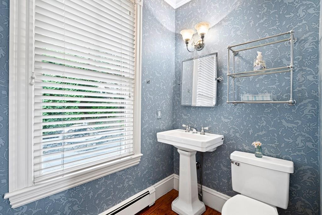 8 Garden Road Wellesley, MA 02481 - Photo 14 of 30 a bathroom with a sink and a mirror