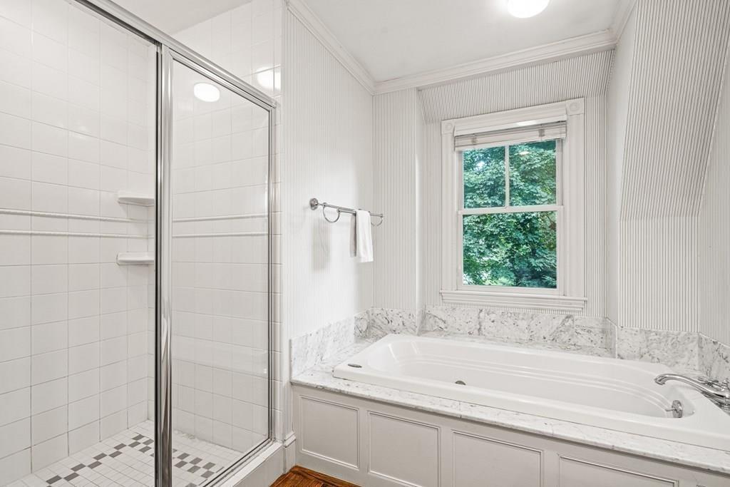8 Garden Road Wellesley, MA 02481 - Photo 19 of 30 a bathroom with a bathtub and a shower