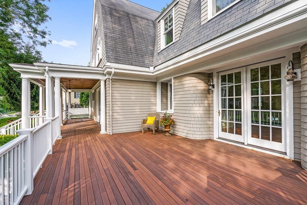 8 Garden Road Wellesley, MA 02481 - Photo 4 of 30 a view of a house with porch and wooden floor