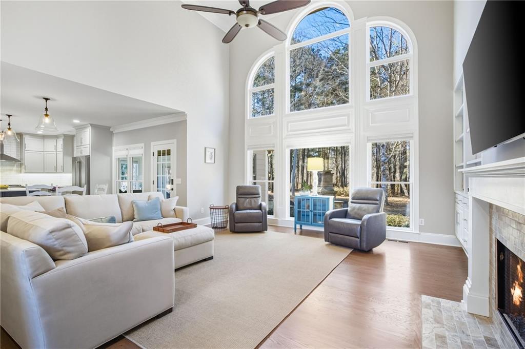 5318 Tallgrass Way Kennesaw, GA 30152 - Photo 14 of 70 a living room with furniture fireplace and a large window