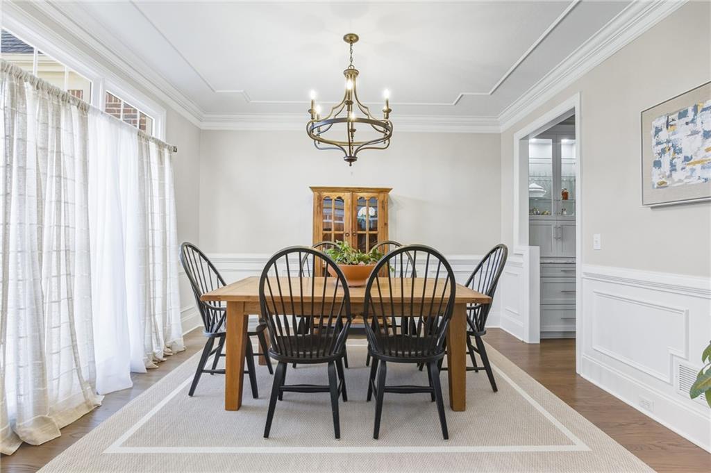 5318 Tallgrass Way Kennesaw, GA 30152 - Photo 3 of 70 a view of a dining room with furniture window and wooden floor