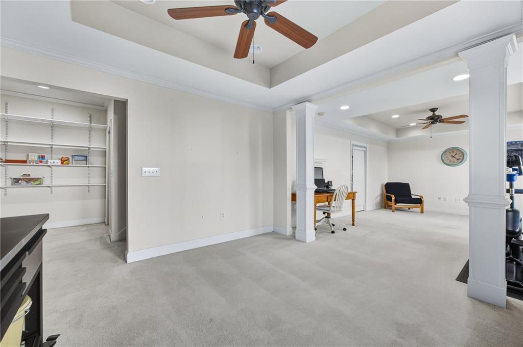 5318 Tallgrass Way Kennesaw, GA 30152 - Photo 46 of 70 a view of a livingroom with a furniture and a ceiling fan