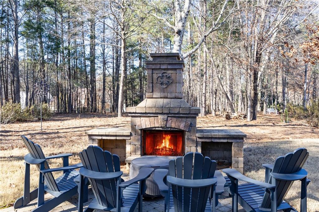 5318 Tallgrass Way Kennesaw, GA 30152 - Photo 50 of 70 a view of a chairs and fire pit in the patio