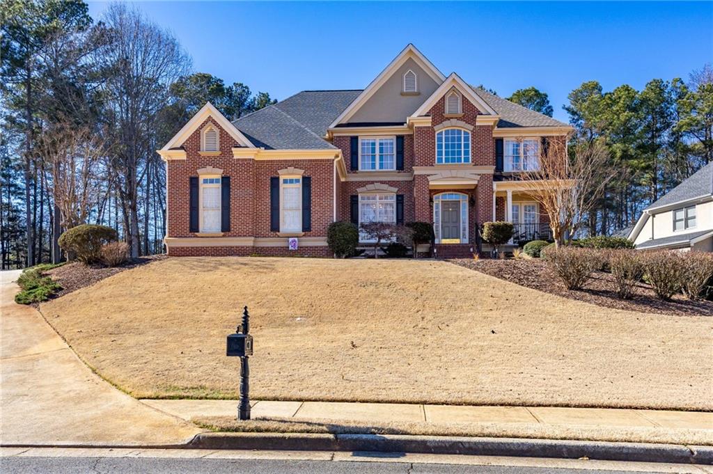 5318 Tallgrass Way Kennesaw, GA 30152 - Photo 66 of 70 a front view of a house with a yard