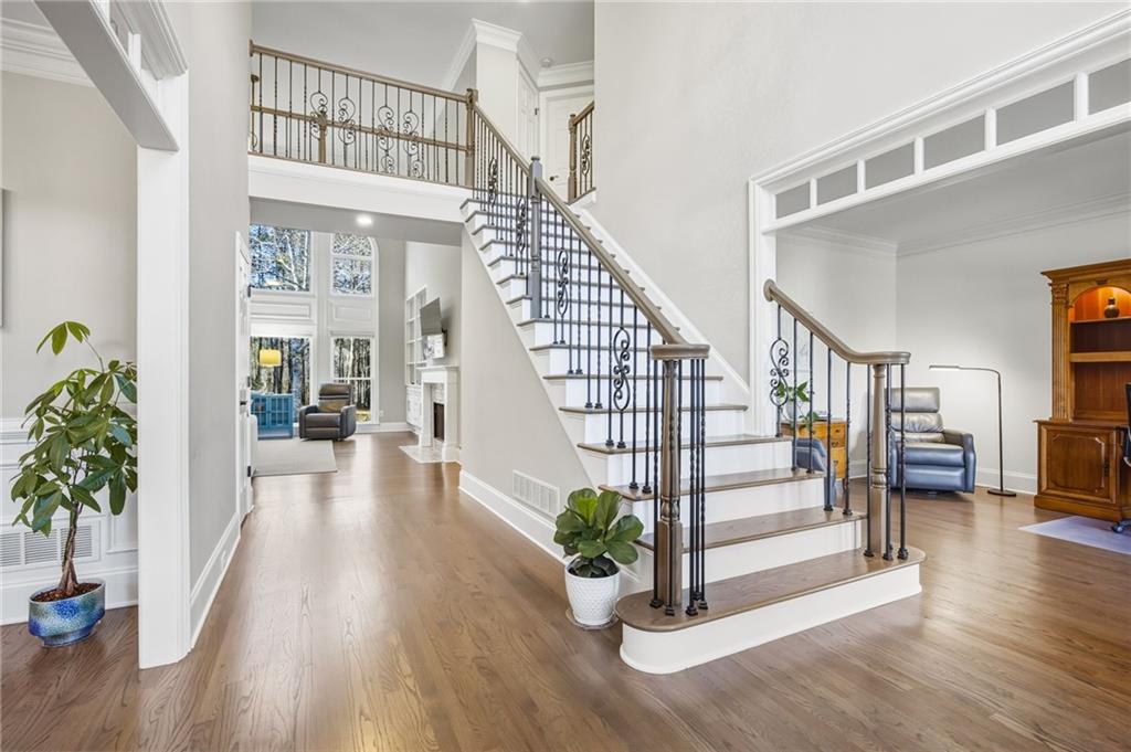 5318 Tallgrass Way Kennesaw, GA 30152 - Photo 9 of 70 a view of entryway with wooden floor and a front door