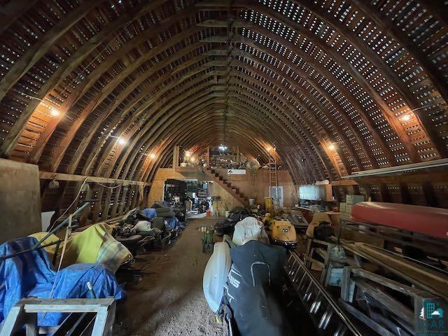 65073 Charles Johnson Road Ashland, WI 54806 - Photo 23 of 27 There is an upper story loft at the back of the pole barn.