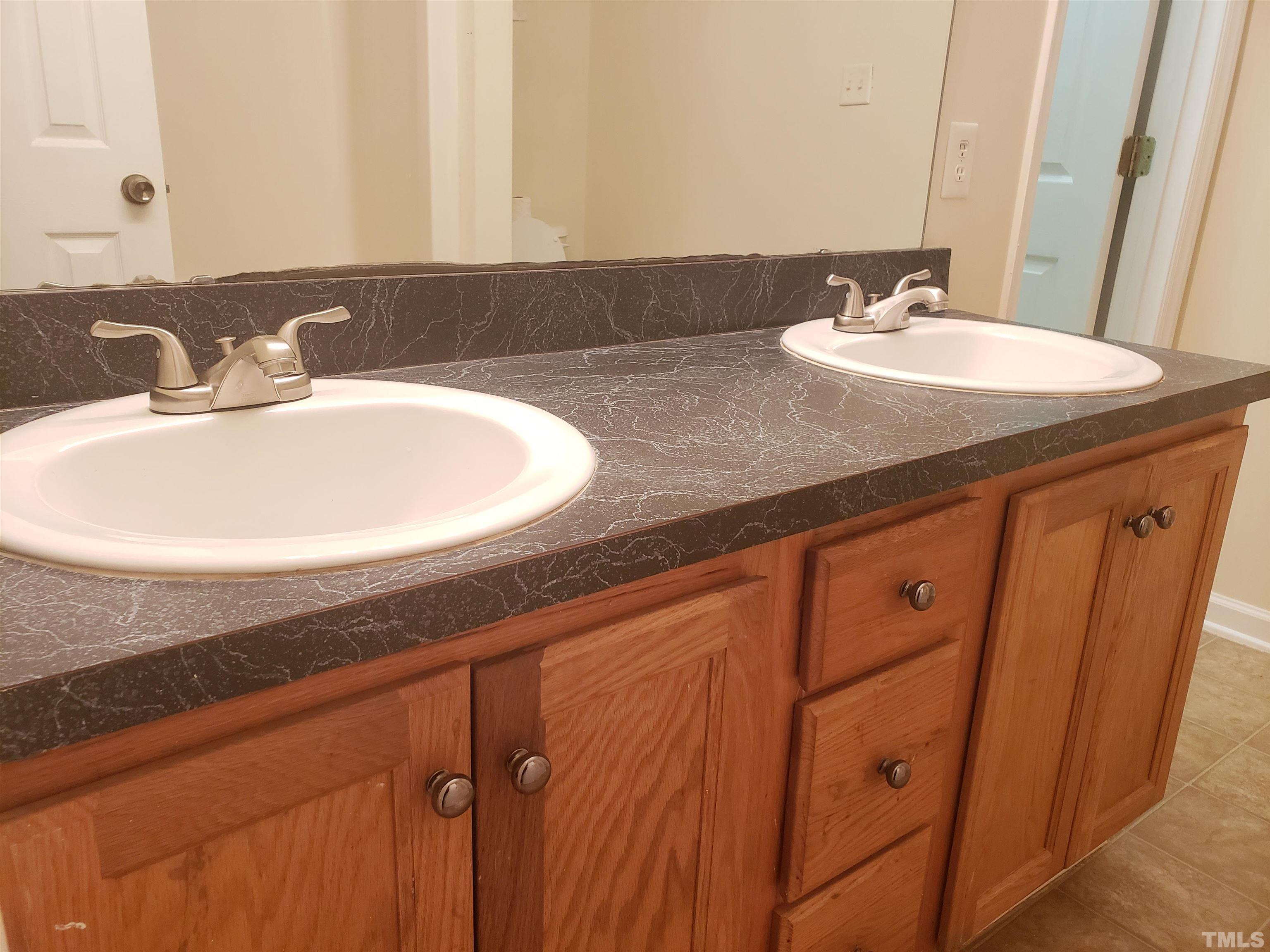 540 Barnes Lake Road, Unit B Middlesex, NC 27557 - Photo 13 of 17 a bathroom with a sink and a mirror