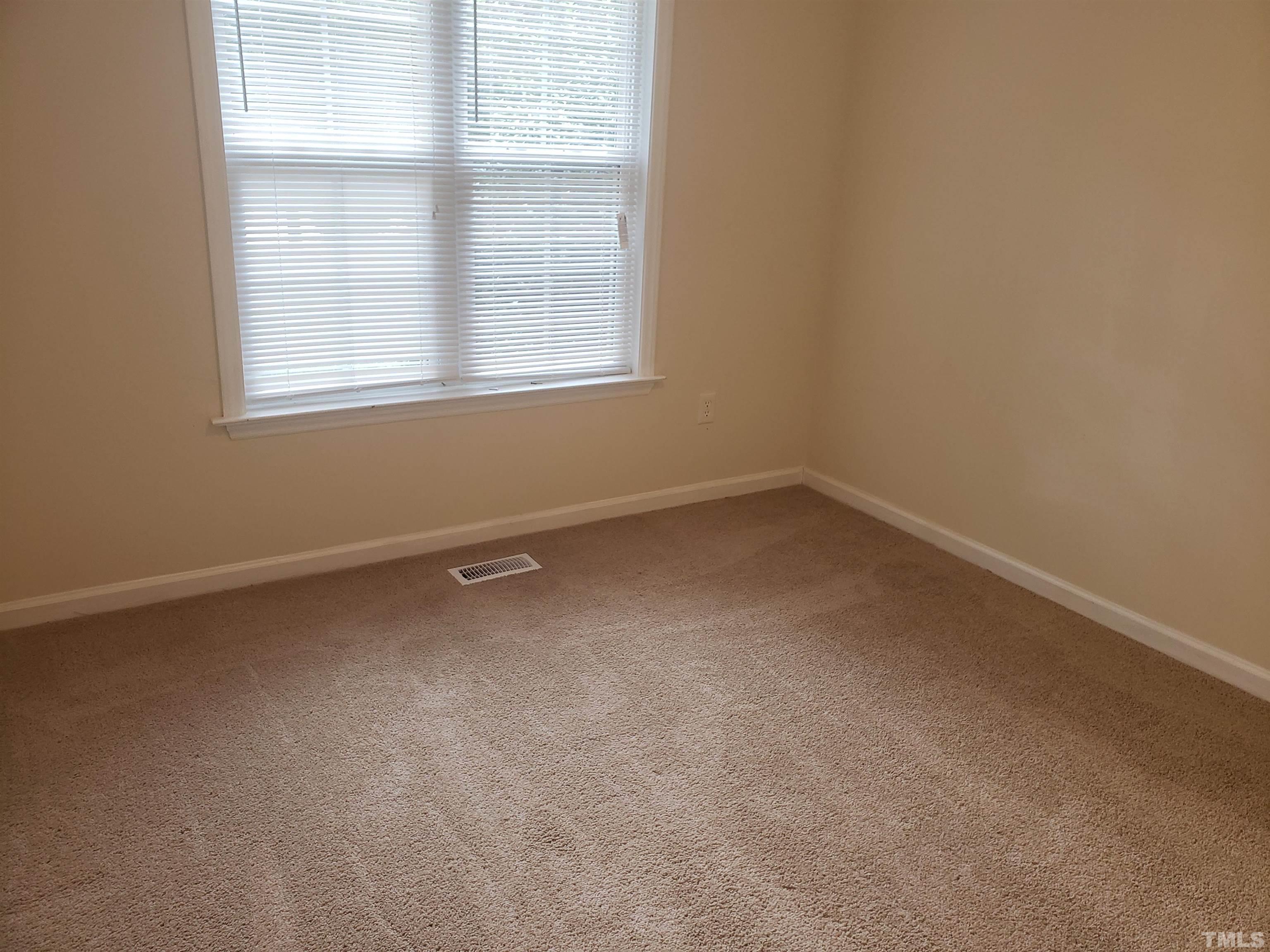 540 Barnes Lake Road, Unit B Middlesex, NC 27557 - Photo 6 of 17 an empty room with a window