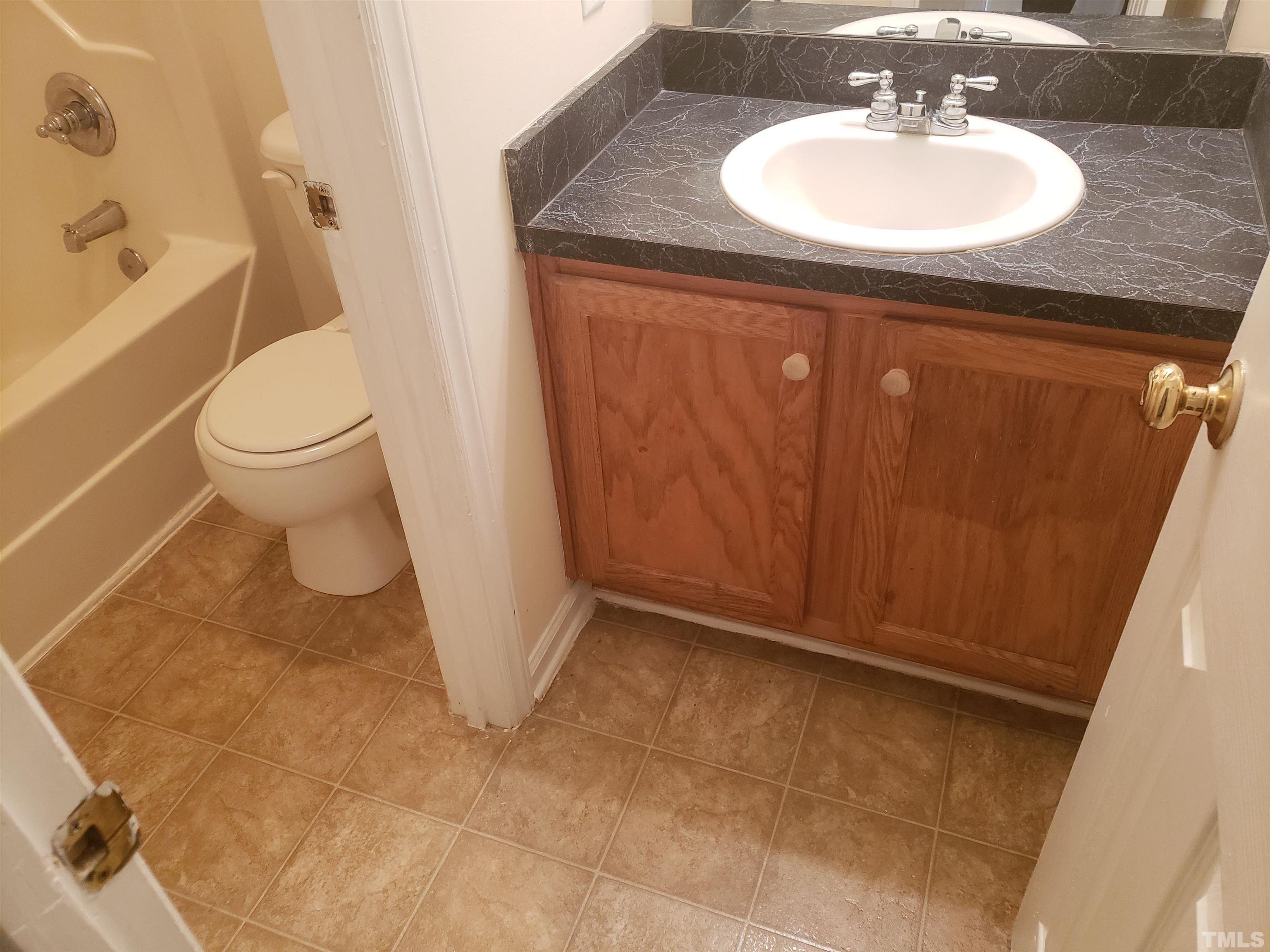 540 Barnes Lake Road, Unit B Middlesex, NC 27557 - Photo 10 of 17 a bathroom with a sink toilet and shower