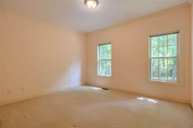 an empty room with windows