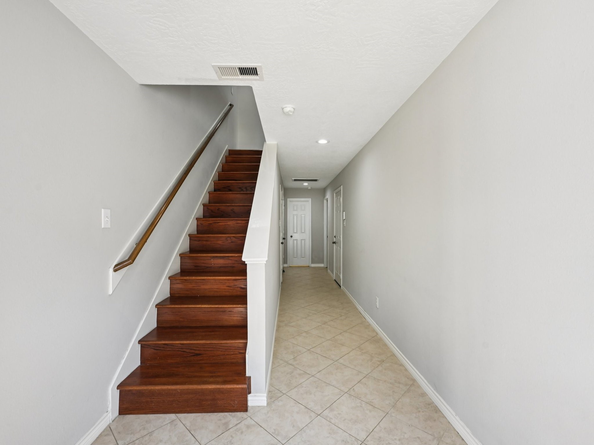 1405 Bailey Street Houston, TX 77019 - Photo 5 of 26 Wood stair treads and risers add elegance.