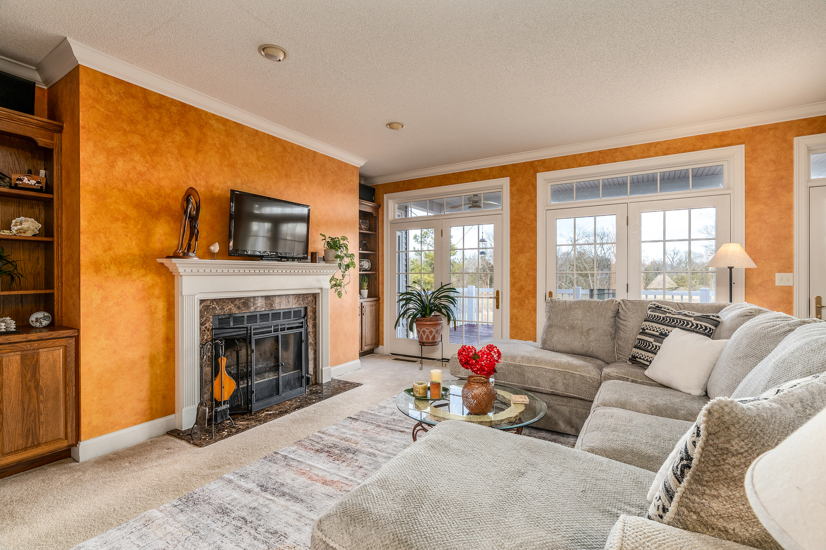 4996 Andrew Road Marion, IL 62959 - Photo 11 of 85 a living room with furniture a floor to ceiling window and a fireplace