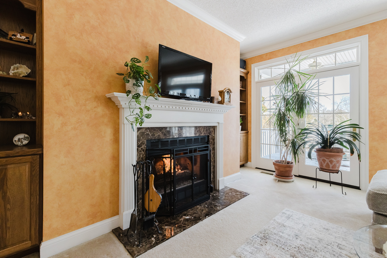 4996 Andrew Road Marion, IL 62959 - Photo 13 of 85 a living room with furniture a flat screen tv and a fireplace