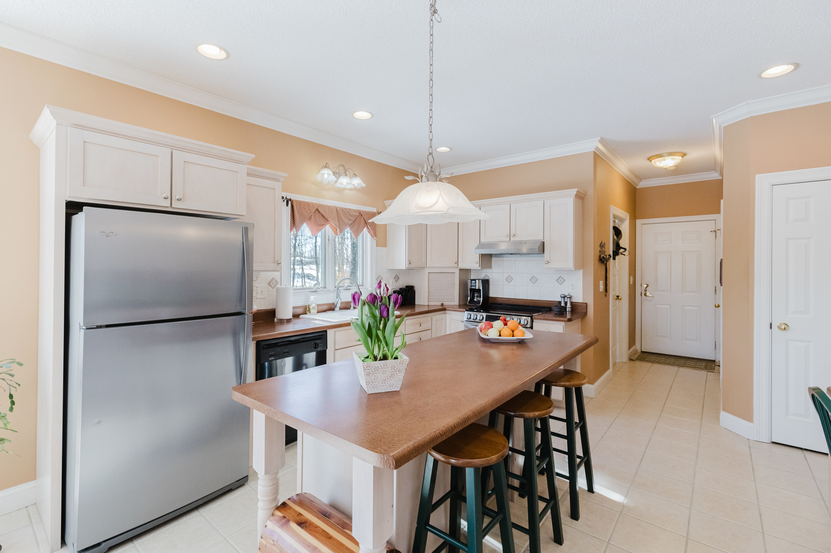 4996 Andrew Road Marion, IL 62959 - Photo 18 of 85 a kitchen with stainless steel appliances a refrigerator a sink a stove a dining table and chairs