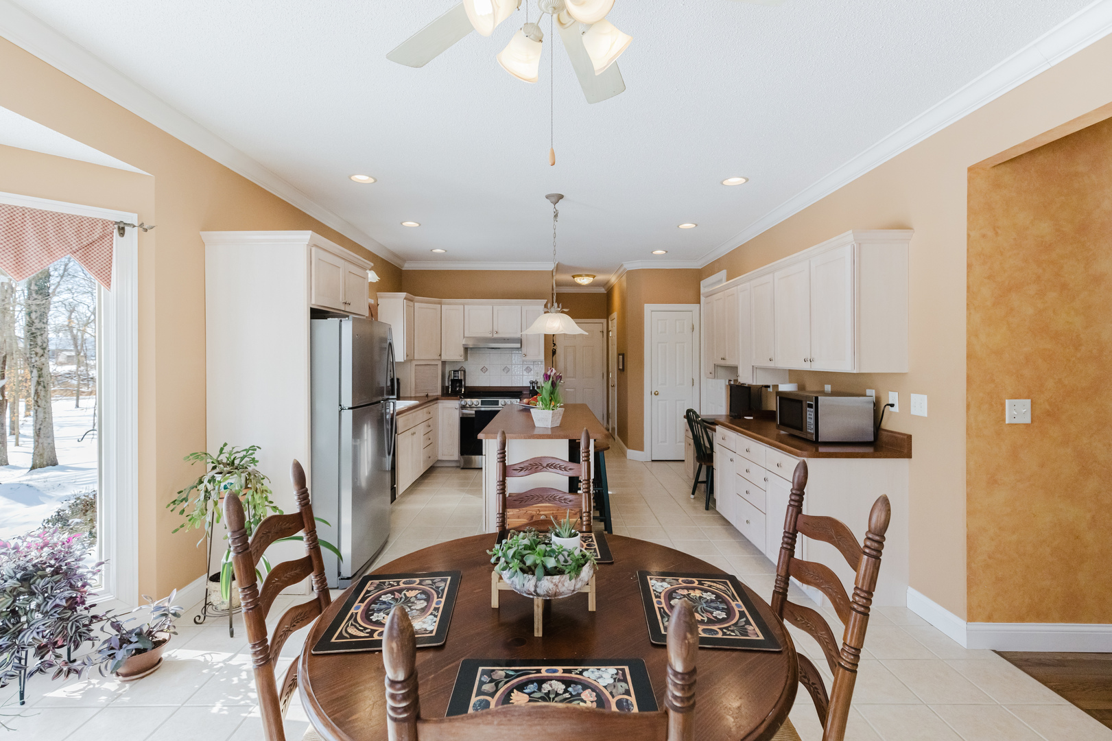 4996 Andrew Road Marion, IL 62959 - Photo 25 of 85 a view of a dining room with furniture a kitchen and chandelier
