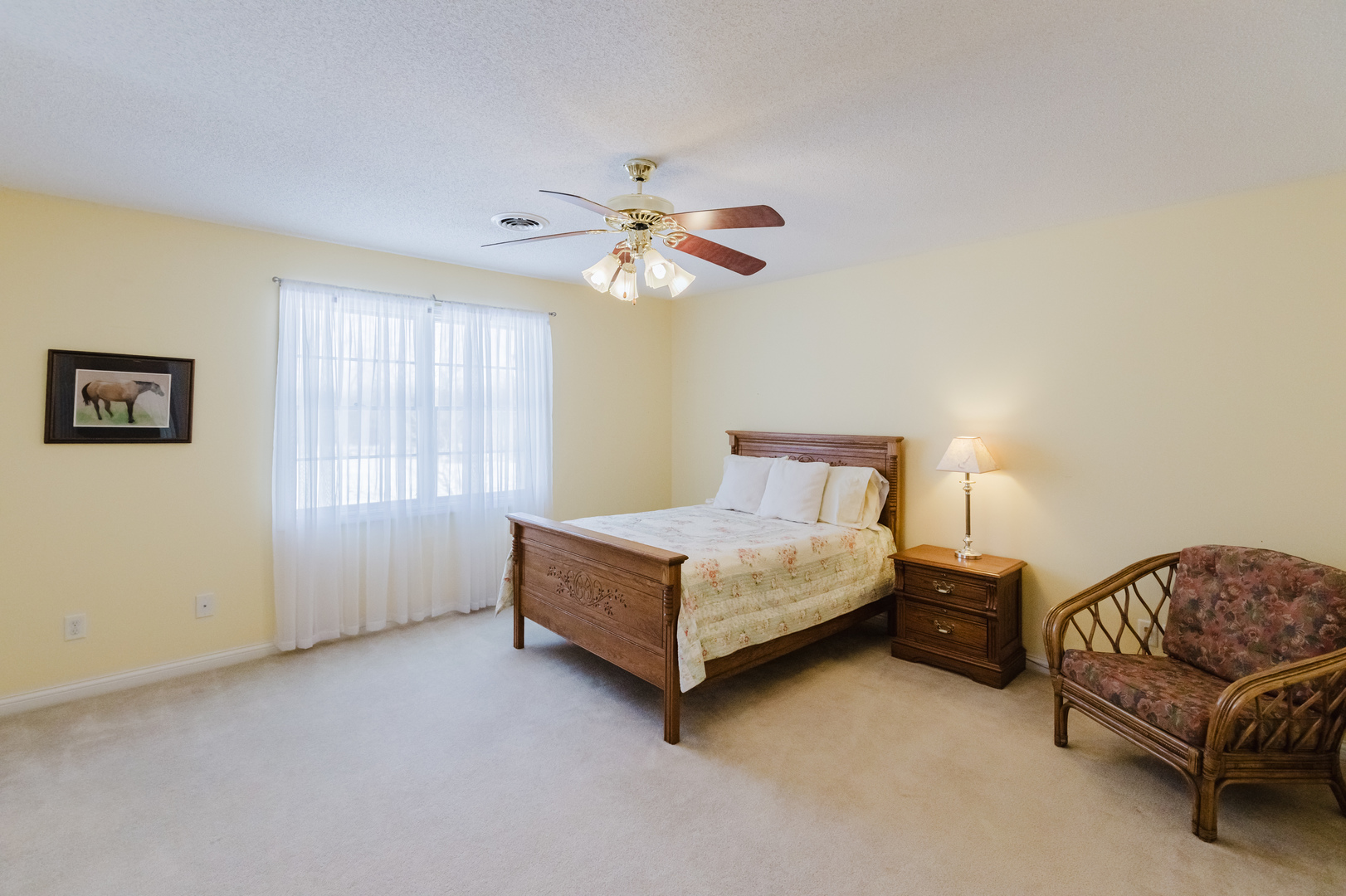 4996 Andrew Road Marion, IL 62959 - Photo 39 of 85 a bedroom with a bed couch chandelier and a window
