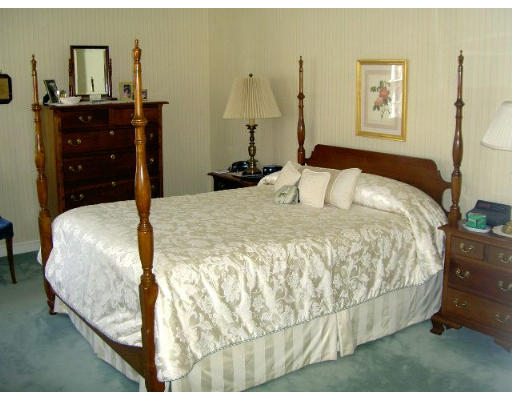 28 Norwich Road Wellesley, MA 02481 - Photo 11 of 14 a bedroom with a bed and a dresser