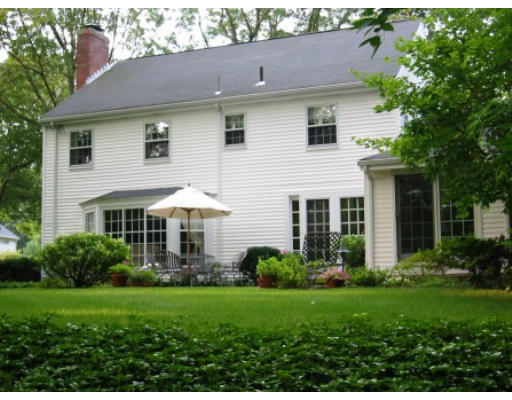 28 Norwich Road Wellesley, MA 02481 - Photo 12 of 14 a view of a house with a yard and plants