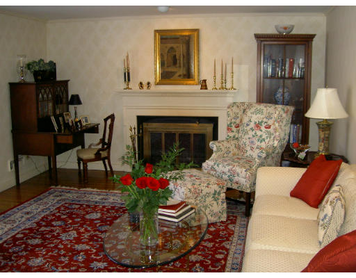 28 Norwich Road Wellesley, MA 02481 - Photo 3 of 14 a living room with furniture and a fireplace