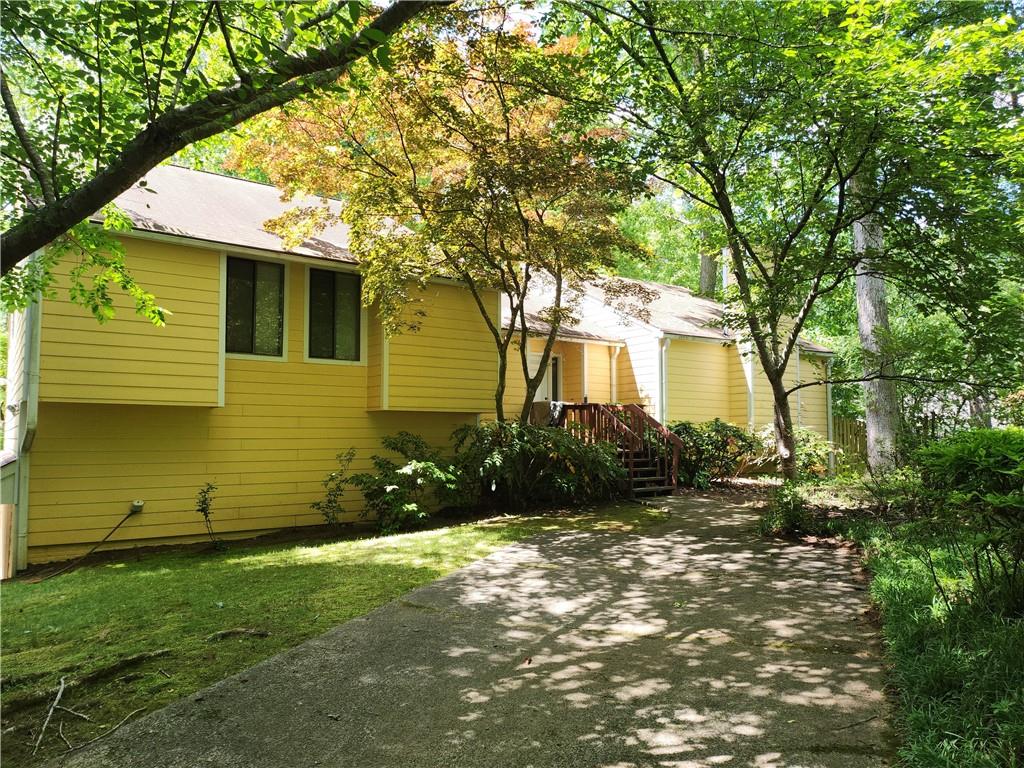 363 Weatherstone Lane Marietta, GA 30068 - Photo 1 of 1 a view of a house with a yard