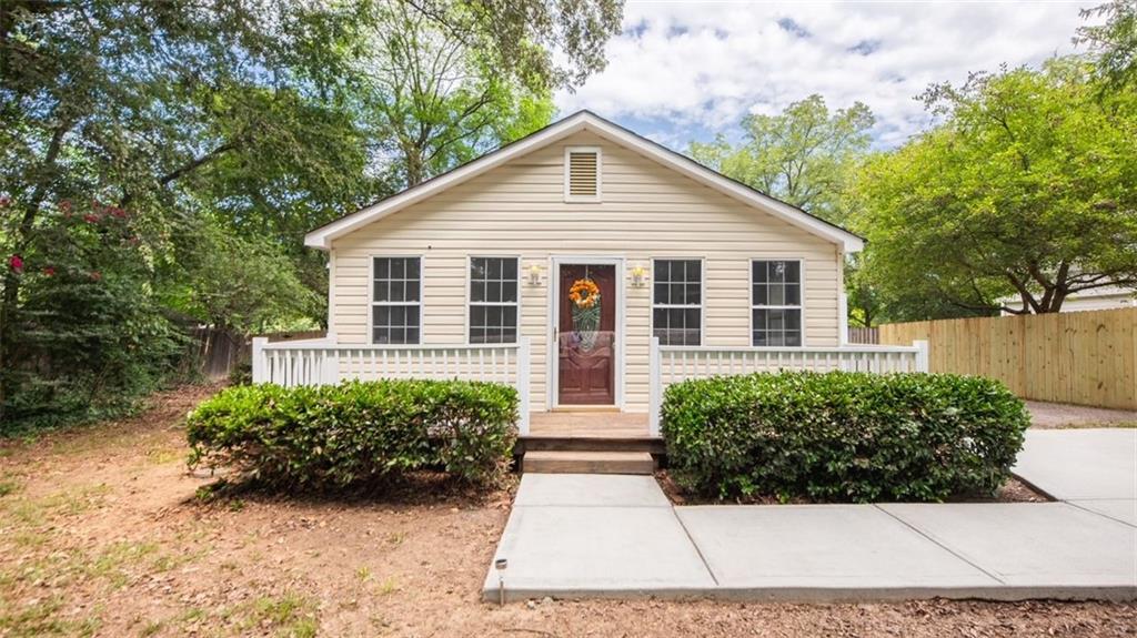 3850 Southside Drive Acworth, GA 30101 - Photo 1 of 1 a view of front of house with a yard