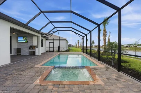 a view of a swimming pool with a porch