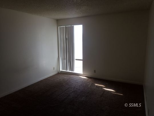 714 North Sanders Street Ridgecrest, CA 93555 - Photo 13 of 15 a view of an empty room and window