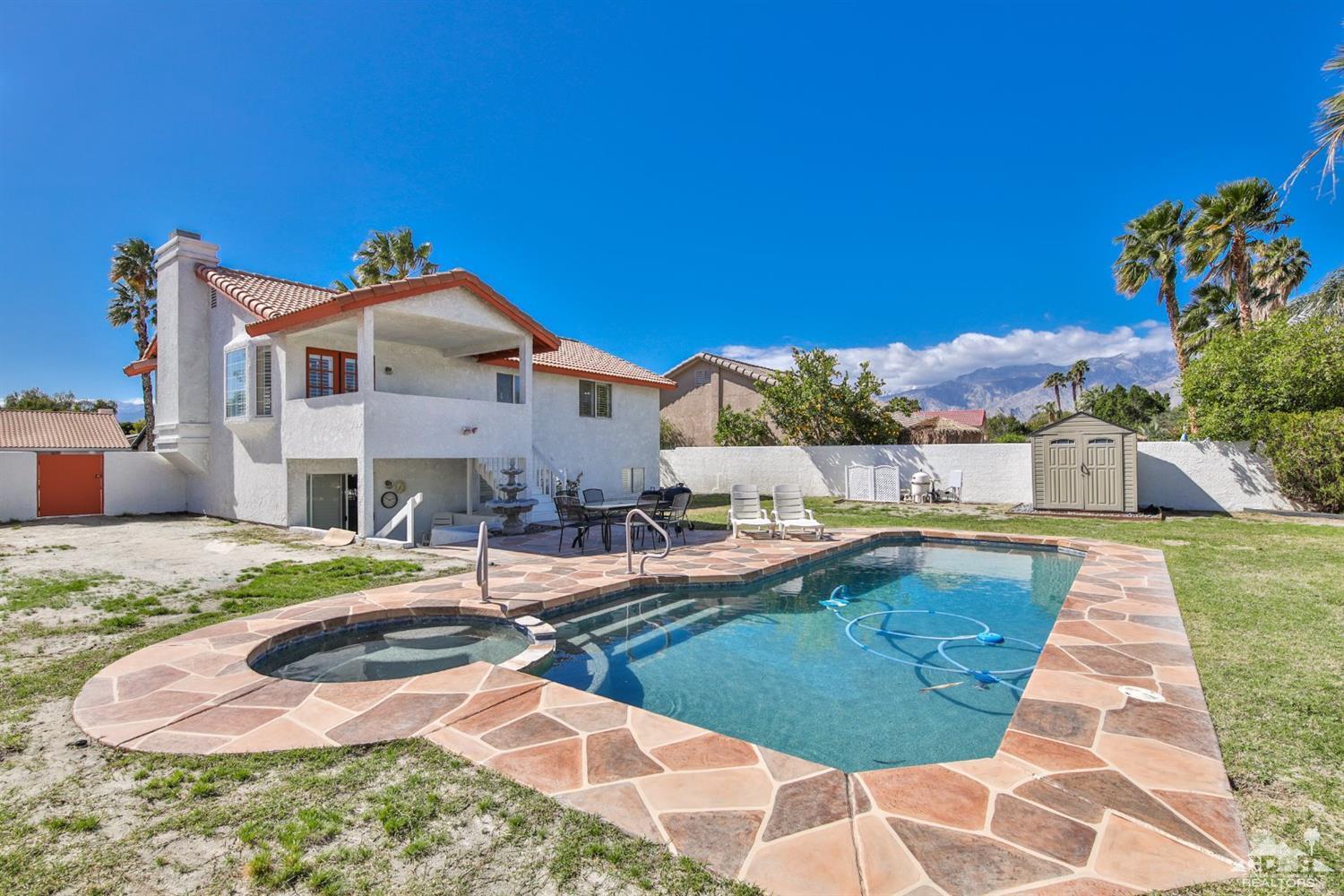 68420 Risueno Road Cathedral City, CA 92234 - Photo 4 of 37 a swimming pool with outdoor seating and yard
