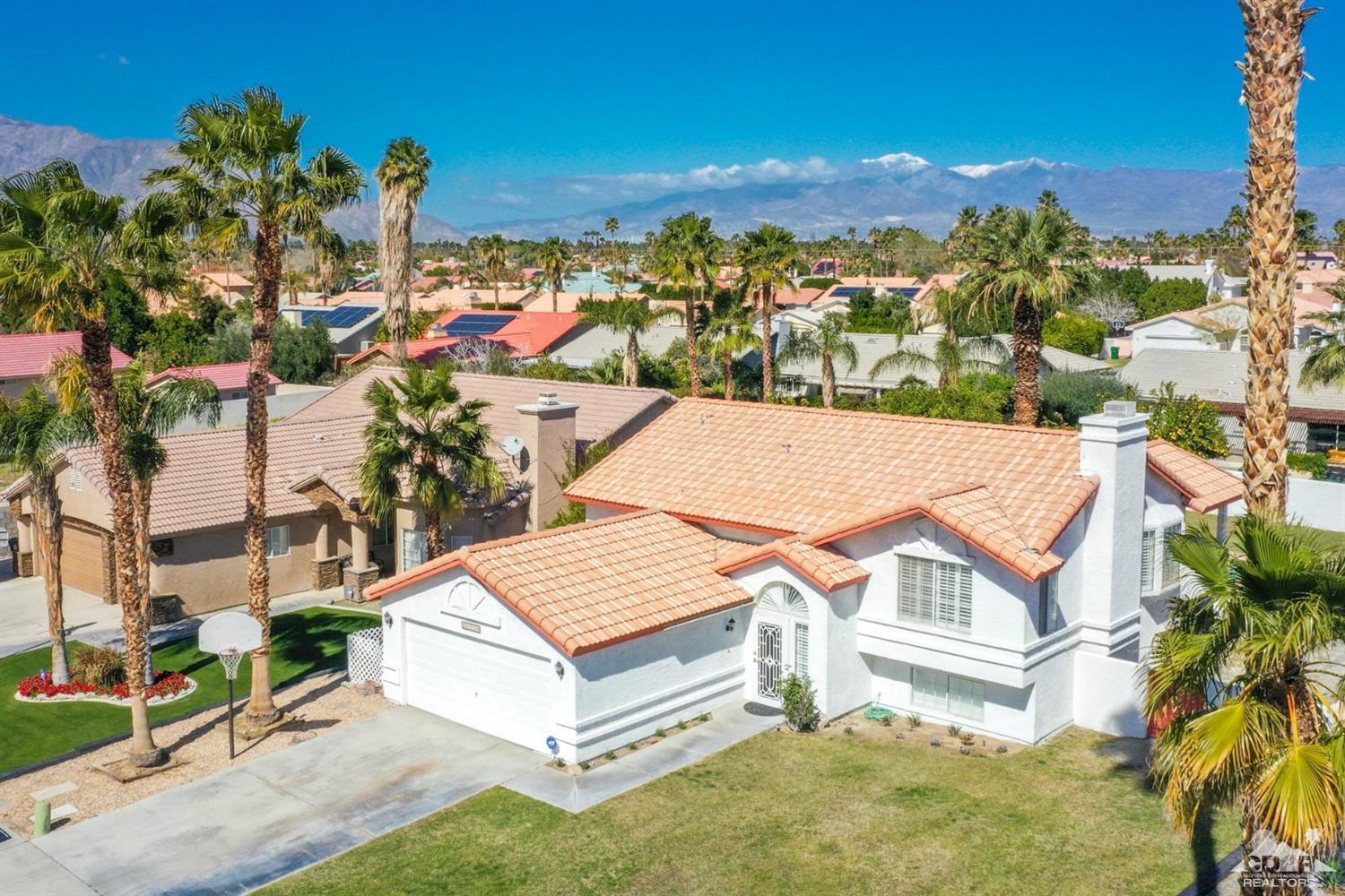 68420 Risueno Road Cathedral City, CA 92234 - Photo 31 of 37 an aerial view of residential houses with outdoor space and trees